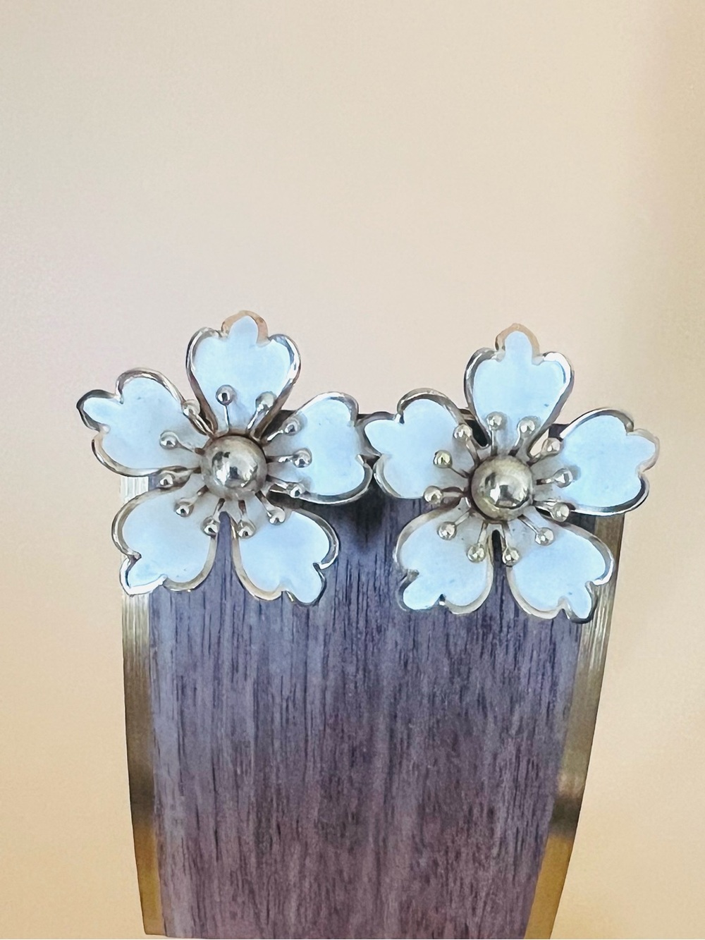 Large white enamel flower clip on earrings, gold tone
